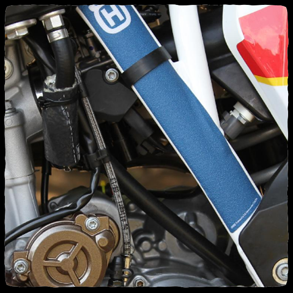 DEI Fire Sleeve shown covering Husqvarna fuel line